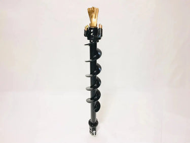 A black Digga combination auger bit rests on a white surface. The auger bit has a wide, smooth body and a sharp, spiral tip.
